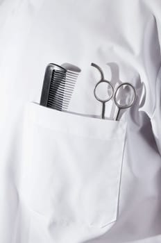 Scissors and a comb in a barberŽs pocket