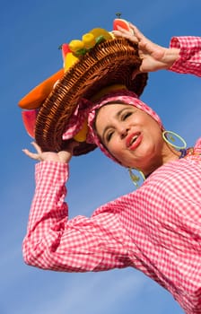Low angle view of a mature woman selling fruits
