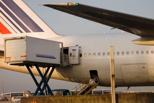 Deck loading in an airplane, Paris, Ile_de_France, France