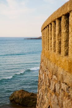 Stone wall at the coast, Biarritz, Bay of Biscay, Aquitaine, France
