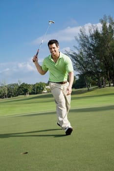 Golfer playing golf in a golf course and smiling, Biltmore Golf Course, Coral Gables, Florida, USA