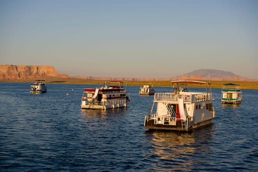 Houseboats in the lake, Glen Canyon Dam, Lake Powell, Colorado River, Page, Arizona, USA