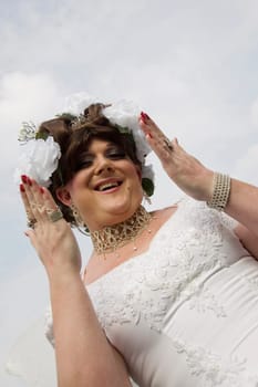 Low angle view of a gay man blowing a kiss