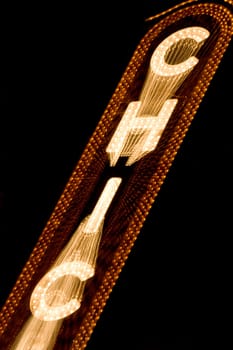 Low angle view of Chicago neon sign lit up at night, Chicago Theatre, Chicago, Illinois, USA