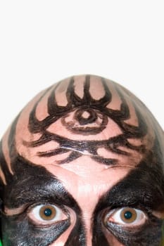 Portrait of a mid adult man with face paint on his face