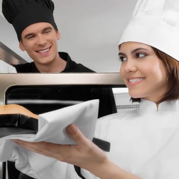 Chefs preparing food in the kitchen