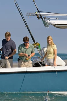 Tourists fishing in the sea