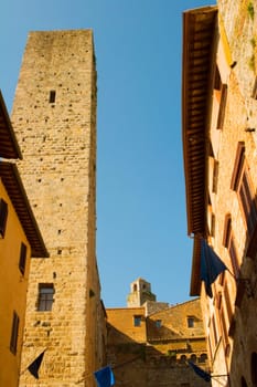 Low angle view of buildings in a city, Monteriggioni, Siena Province, Tuscany, Italy