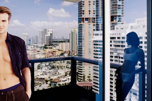 Young couple standing in a balcony