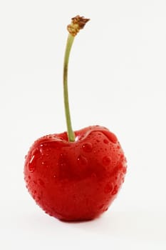 Close_up of water drops on a cherry
