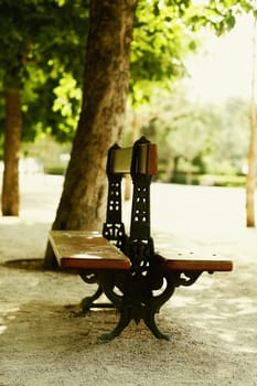 Empty bench in a park, Madrid, Spain
