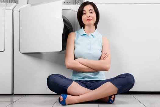 Woman in a laundromat