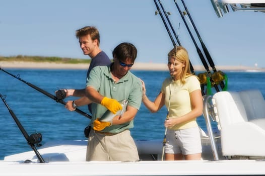 Tourists fishing in the sea