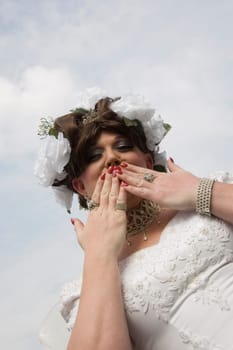 Low angle view of a gay man blowing a kiss