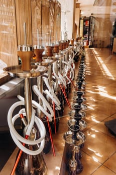 Hookah in souvenir shop. Hookahs on display in the store. A lot of hookahs in the store
