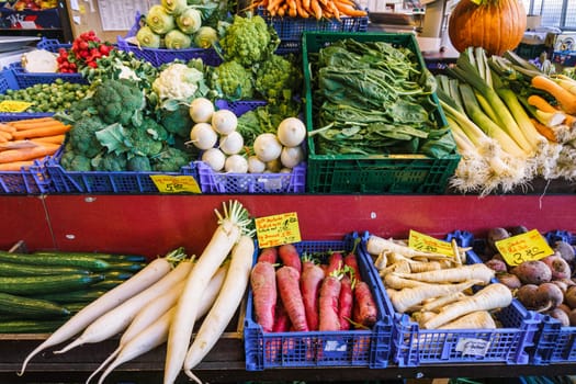 Fruit and vegetable market. Lots of different fresh fruits and vegetables.