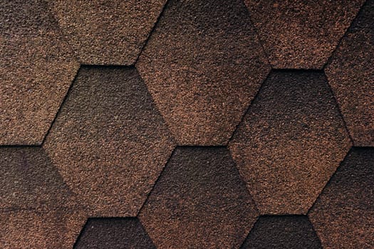 Soft shingles tiles closeup. The texture of the roof of the roof, made of shingles. The texture of shingles.