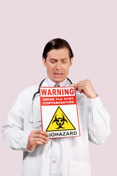 Doctor showing a Biohazard warning sign and crying