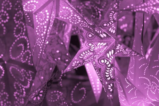 Beautiful shiny star mood lamp in merry advent decoration. Traditional symbol of the best miracle time of the year. Part of series.
