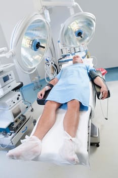 Patient lying on an operation table