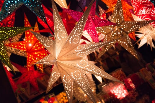 Beautiful shiny star mood lamp in merry advent decoration. Traditional symbol of the best miracle time of the year. Part of series.