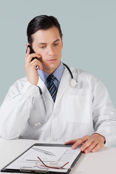 Doctor talking on a mobile phone