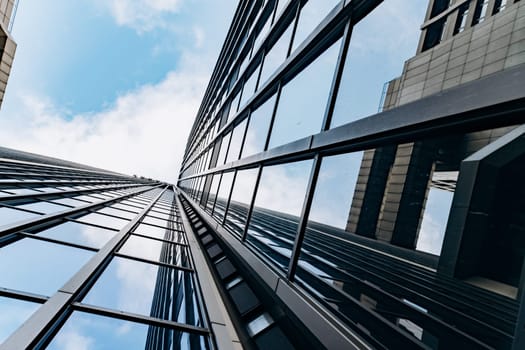 Blue skyscraper facade. office buildings. modern glass silhouettes