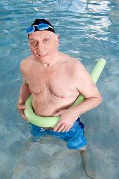 Man using a pool float in a swimming pool