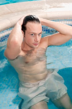 Man relaxing in a hot tub