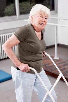 Disabled woman walking with a walker