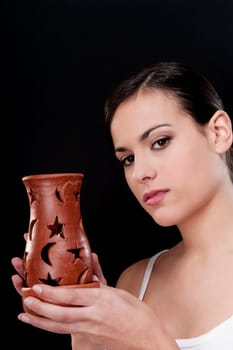 Portrait of a woman holding an incense burner