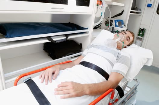 Patient lying in an ambulance