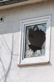 Broken Windows in the house. Shards of glass remained in the window.
