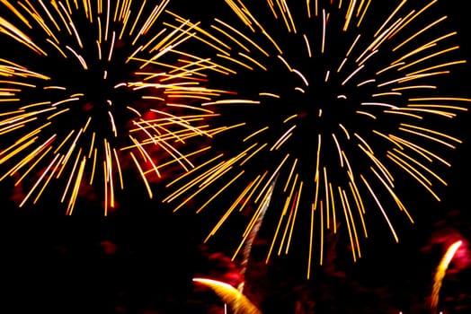 Colourful multiple fireworks in the night sky