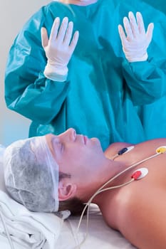 Surgeon with a patient in an operating room