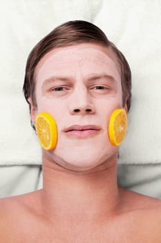 Orange slices on a manŽs face