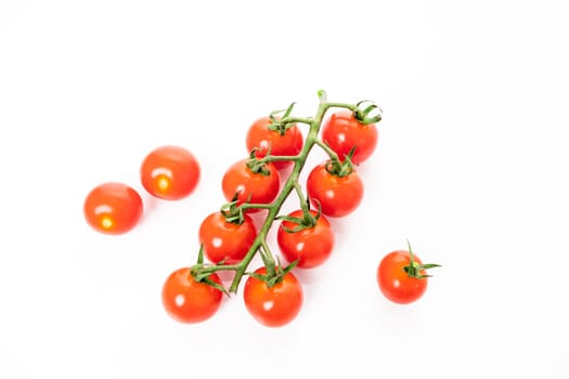 Cherry tomatoes isolated on white background