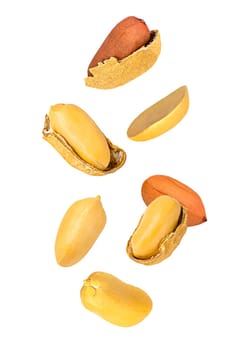 Isolated nuts. Nine flying peanuts witout shell on white with clipping path as package design element. Full depth of field. Food levitation concept.