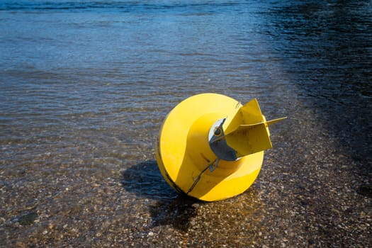 Yellow Anchor buoy on drought river