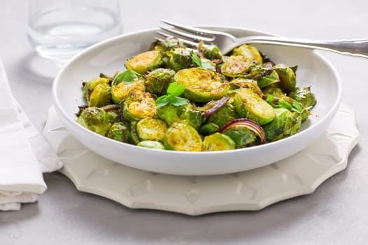 Baked Green Brussels Sprouts with honey and Parmesan cheese.
