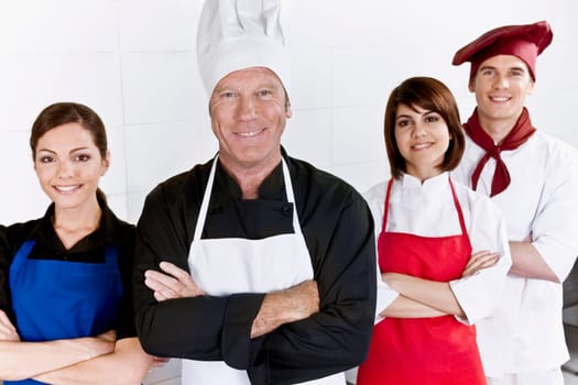 Chefs standing in the kitchen