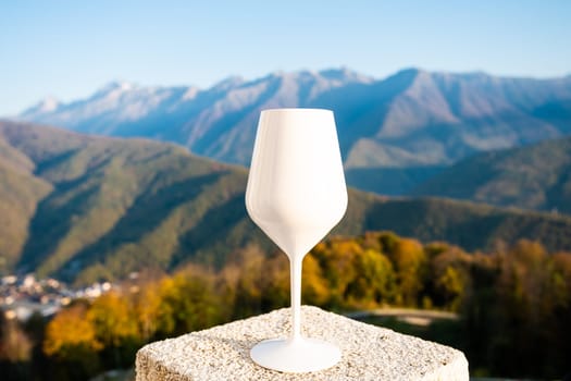 wine glasses on a background of mountains and mountain. mountain vacation