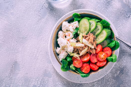 Vegetarian buddha bowl. Raw vegetables and tuna in a one bowl. Vegetarian, healthy, detox food concept