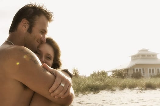 Side profile of a couple embracing each other