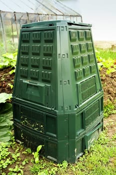 Big composter for recycling of garden refuse and kitchen food waste.
