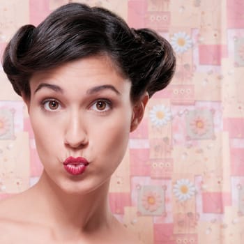 Close_up of a woman puckering her lips