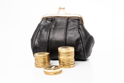 Purse with money isolated on white background