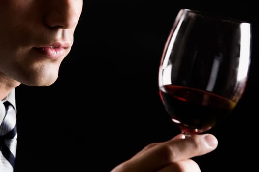 Businessman holding a wine glass