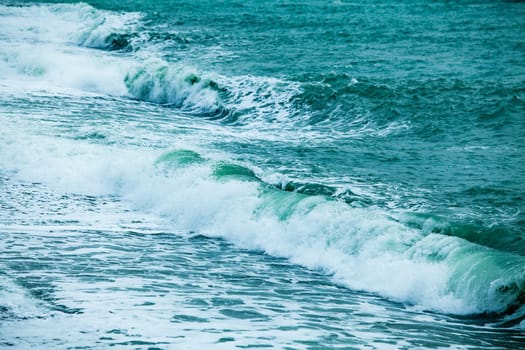 waves on the surface of the blue sea