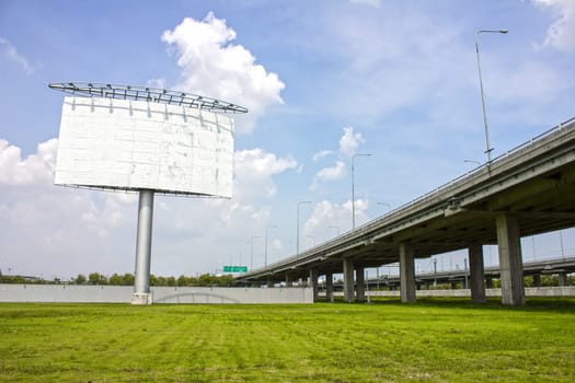 Highway advertising board